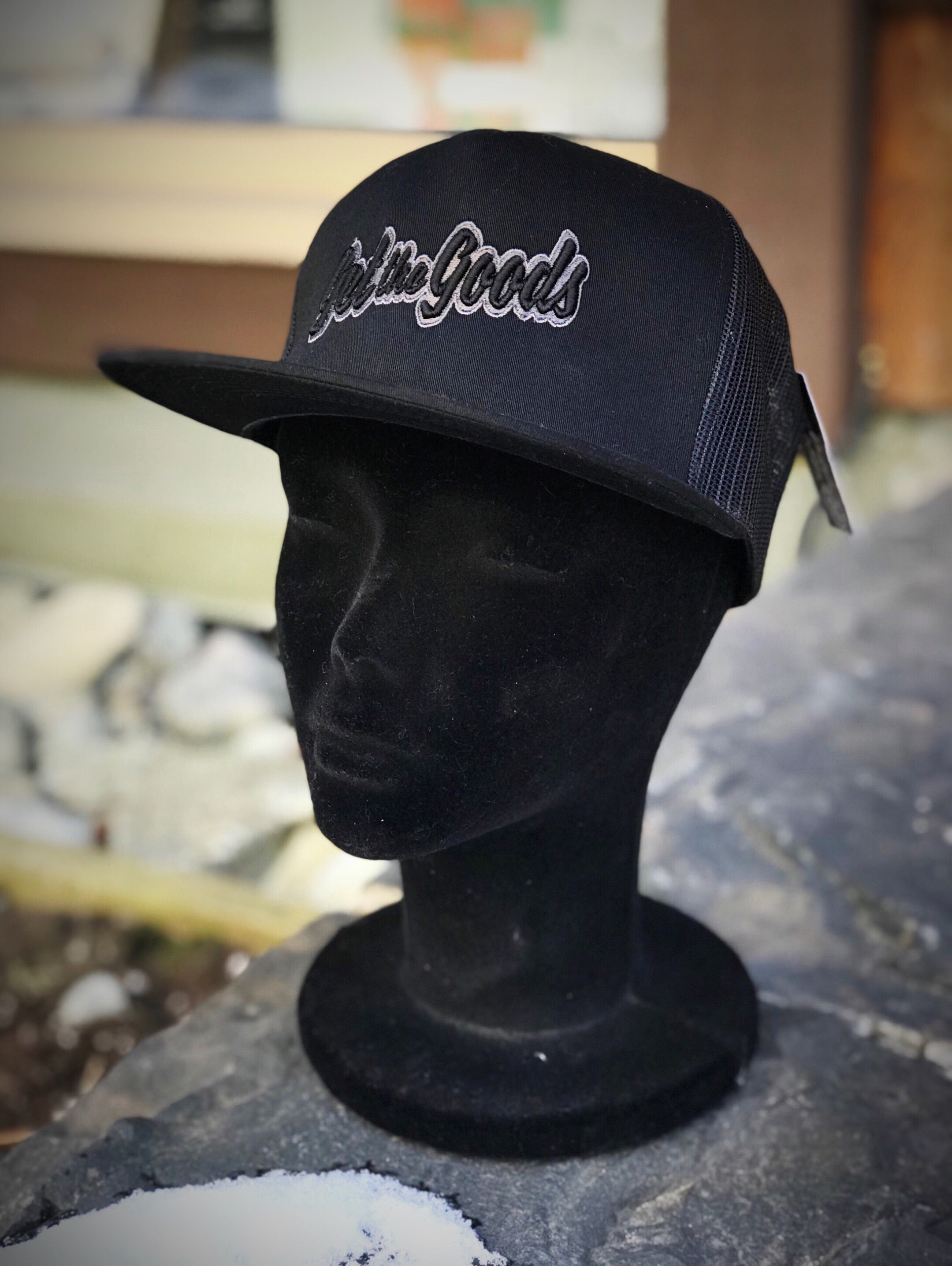 Get the Goods Black Trucker Hat